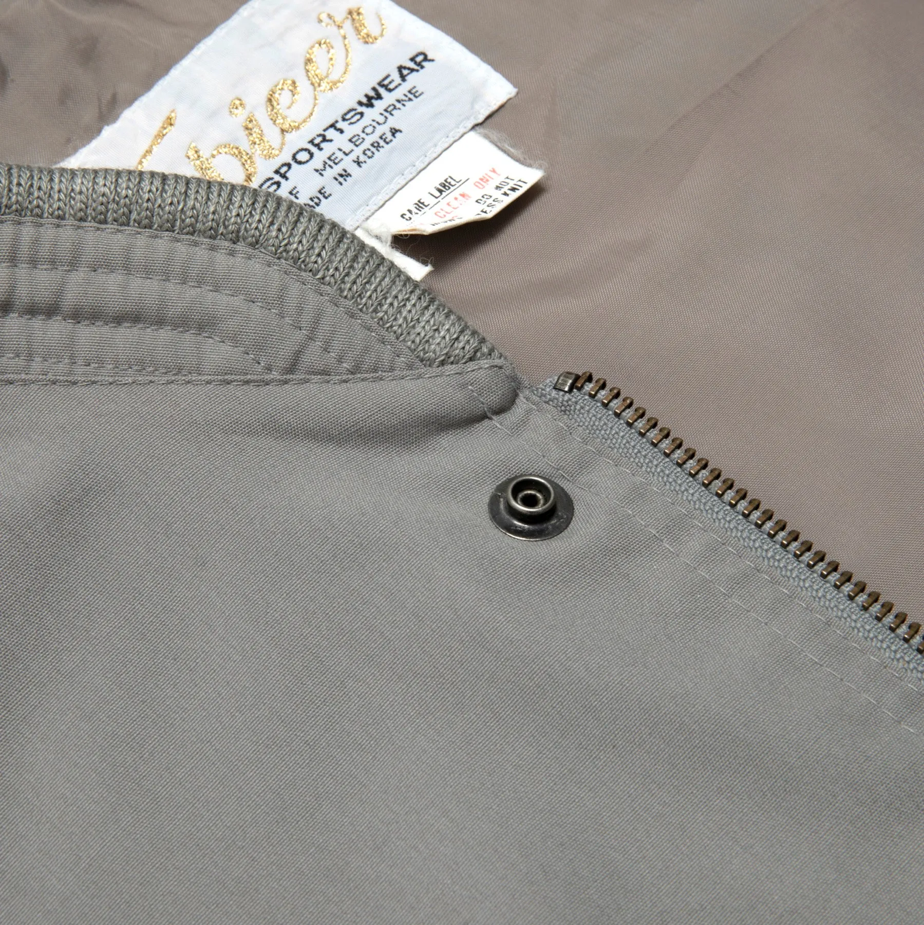 Coated Plain Weave Structured Bomber Jacket